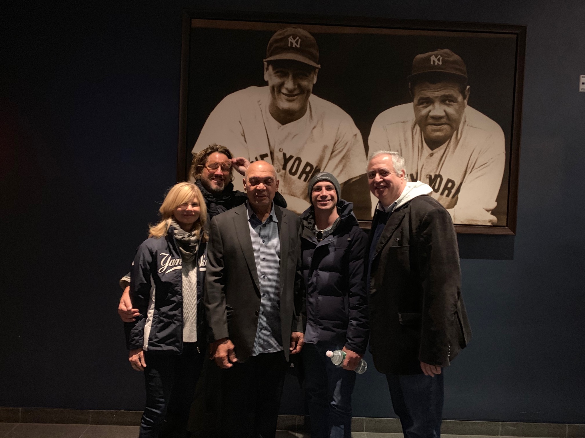 Reggie-Jackson-Jon-Doscher-Nick-Vallelonga-Yankees-in-front-of-photo-BABE-RUTH-AND-LOU-GEHRIG
